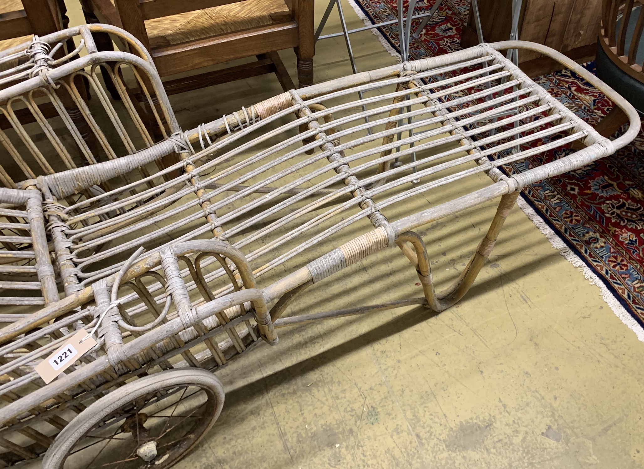 A vintage bamboo garden lounger, length 190cm, height 66cm
